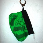 Green handgun & handcuff wristlet Green handgun & handcuff wristlet, SOLD
