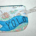 Y.O.L.O. wristlet w/frogs Y.O.L.O. wristlet w/frogs, $26