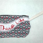 "Thug Life" cowboys & lassos wristlet "Thug Life" cowboys & lassos wristlet, SOLD