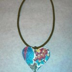 Big heart necklace made with record vinyl covered in vintage wallpaper Big heart necklace made with record vinyl covered in vintage wallpaper, $18