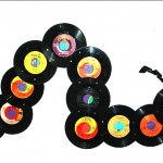 Inchworm picture frame made from 45s, put pics in pockets behind the records' center, great for baby's 1st year Inchworm picture frame made from 45s, put pics in pockets behind the records' center, great for baby's 1st year, SOLD