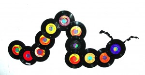 Inchworm picture frame made from 45s, put pics in pockets behind the records' center, great for baby's 1st year, SOLD