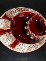 Brown crescent ceramic ashtray
