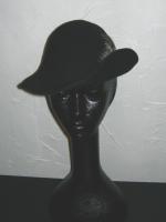 Asymmetrical black felt hat with feather plume