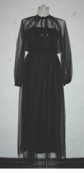 Black velvet spaghetti strap dress overlaid with black Swiss dot tulle by Malcolm Starr