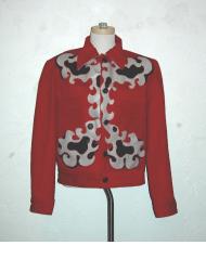 Red corduroy jacket with black and light gray amoebic vinyl appliqu&eacute; by Helen Smith