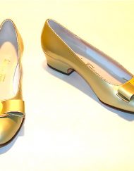 Ferragamo metallic gold Vara ballet flats with signature bow