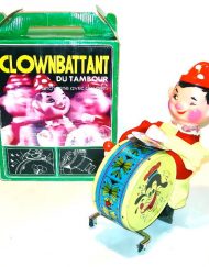 Vintage drumming clown toy