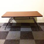 Vintage coffee table by Clifford Pascoe, laminate surface and iron frame, $150